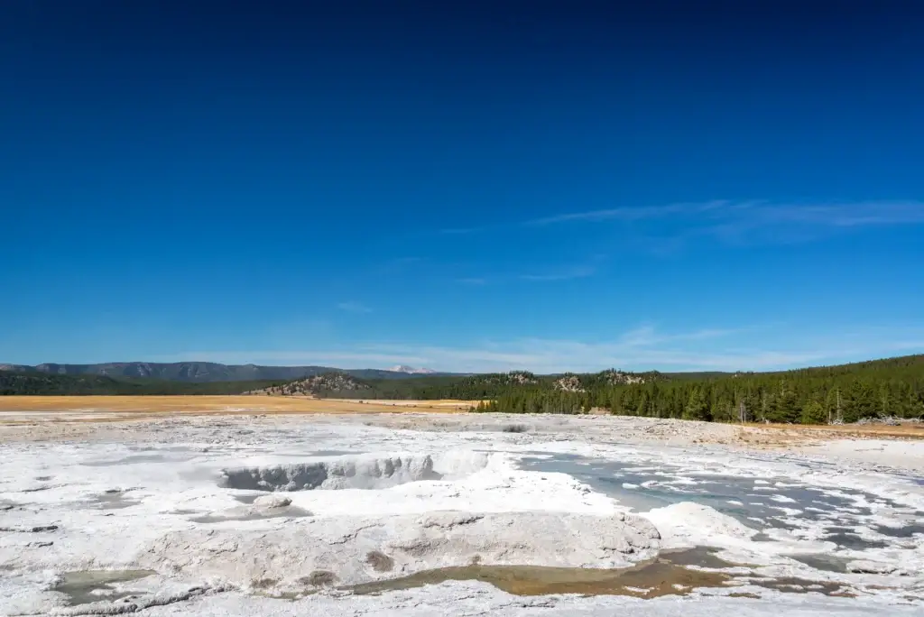 Yellowstone geyser basin, canyon or park road landscape tied to a named park district