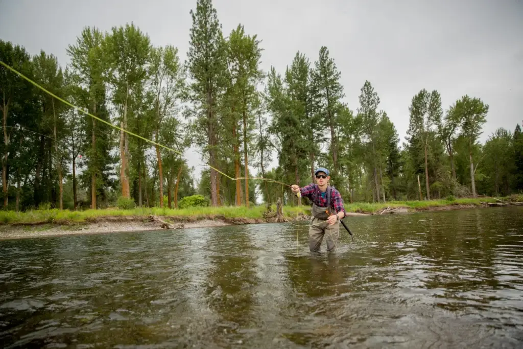 Montana fly-fishing guide and angler on a named river or verified ranch water